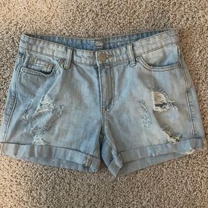 Light blue ripped jean shorts